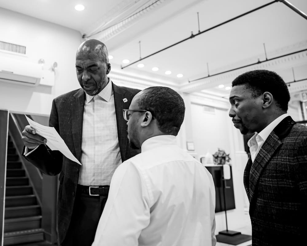 John Salley greeting his hosts on arrival