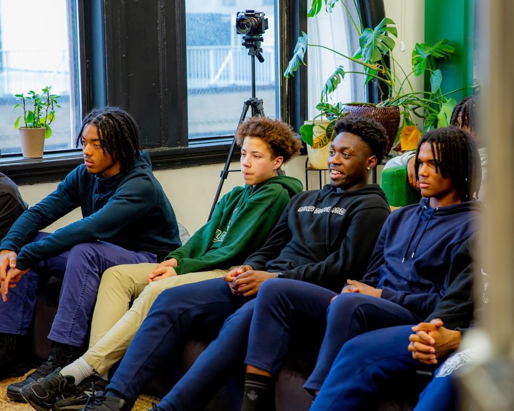 Students listening to John Salley