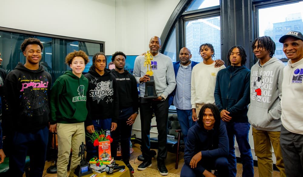 John Salley with the Bedford Academy varsity basketball team and hosts after the fireside chat