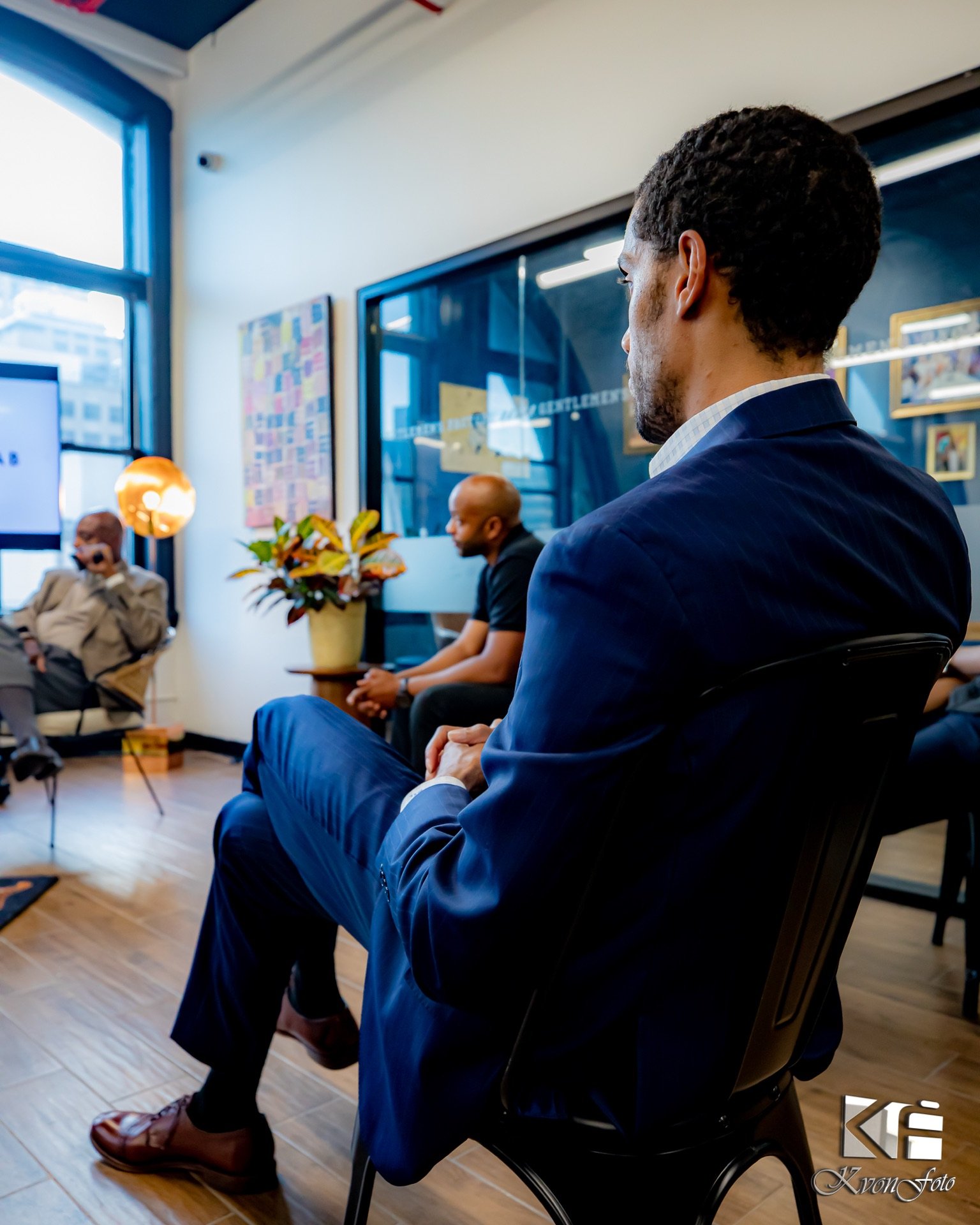 Gentlemen's Factory members in conversation reflecting the program's real-world outcomes